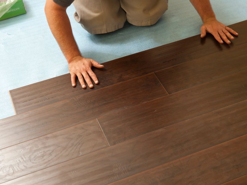 installing vinyl flooring in Wade Hampton Blvd Ste area by Wilkins Carpet and Tile